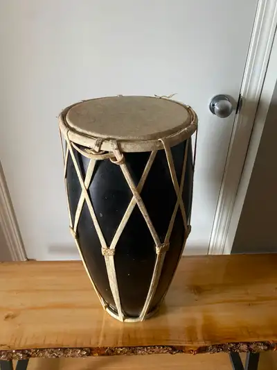 Vintage hand made in India Dholak drum, made in late 1980’s. Skins are made of wild goat skin and ha...