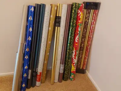 15 rolls of wrapping paper and Rubbermaid container just $25!, View more