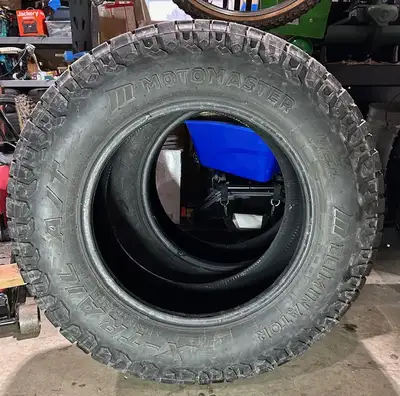 4 Motomaster Eliminator X Trail tires (made by Cooper Tire). Are winter (snowflake) rated and have b...