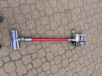This pre-owned Dyson cordless vacuum is being sold as is. The battery will not charge at all Include...