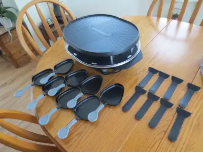 Raclette 8 piece, works awesome