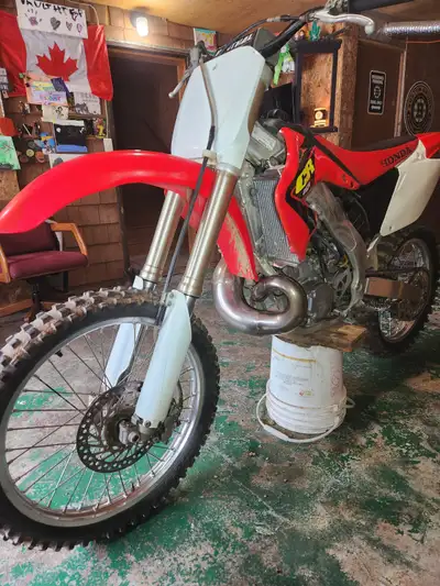 Nice clean cr250. New back tire. Renthal bars. New radiators. FMF fatty pipe and shorty silencer. De...