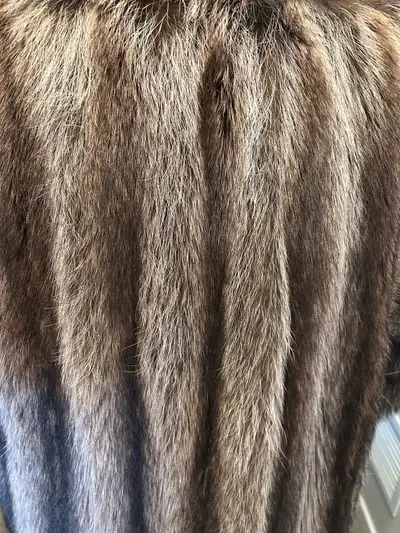 LADIES FULL LENGTH NATURAL RACOON COAT, View more
