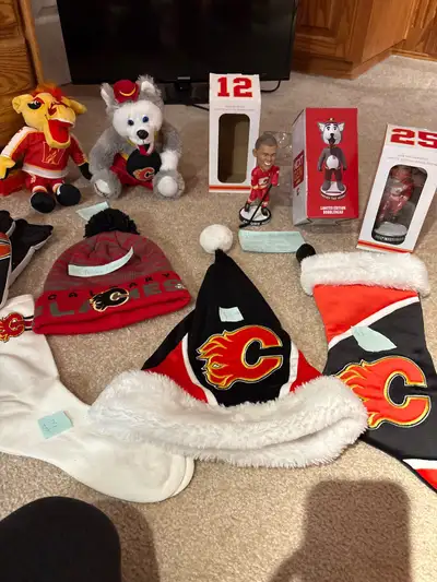 Get your hands on some amazing Calgary Flames merchandise! This collection includes a variety of ite...