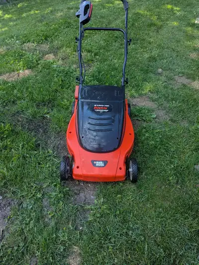 Black and Decker lawn hog 19 inch electric mower in good used condition $60 o.b.o. Call or text 519-...