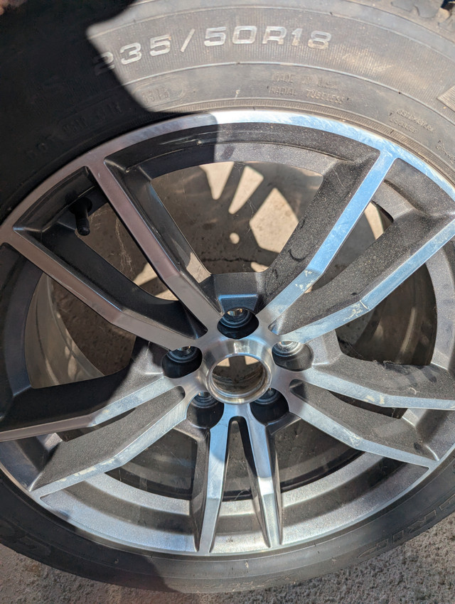 Winter tires 18 inch on aluminum rims and eagle ultra grip tires in Tires & Rims in Hamilton