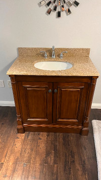 Bathroom vanity set with a matching mirror