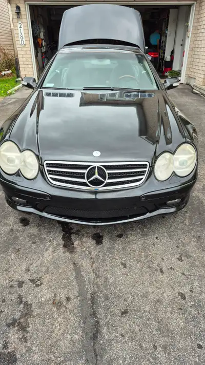 Beautiful 2003 Mercedes SL 500 In very good condition for its year. Convertible and enjoy driving it...