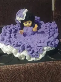 Dresser  doll with purple dress