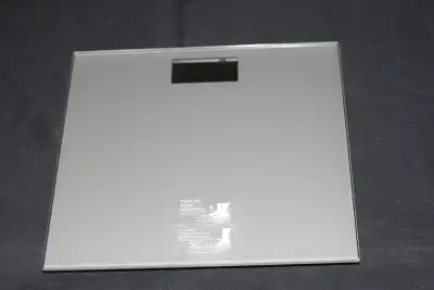 SUPER SLIM DIGITAL SCALE FOR BATHROOM OR ELSEWHERE GLASS SURFACE WEIGHS TO 2/10THS OF A POUND. MAX 3...
