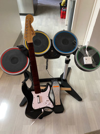 Wii rock band drums and guitar including both dongles