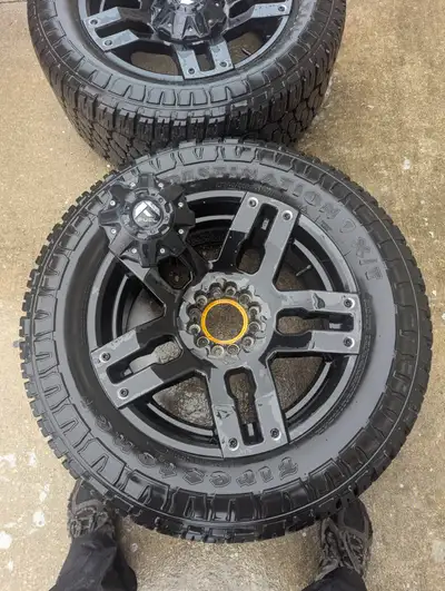 LT305/55R20 Firestones little wear. TPMS and center caps for Fuel Rims. Fits multiple vehicles due t...