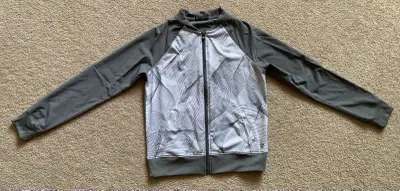 Women’s TUFF ATHLETICS zip-up ((polyester/spandex), 2 pockets, size S/P