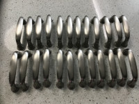 24 Brushed nickel cupboard handles.