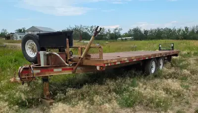 24ft Highboy flatbed trailer 12,000lb axles with loading ramps, toolbox w/ tie down straps. $5000 or...