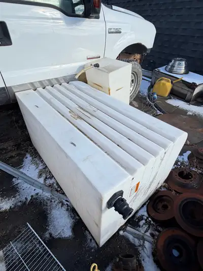 Heavy-duty water storage tanks available — one large 909 litre tank and one smaller unit. Ideal for...