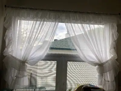 291 Four Panels of White Curtains $20, View more