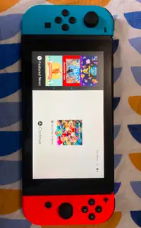 Nintendo Switch Console and Mario Kart Deluxe 8 and Membership