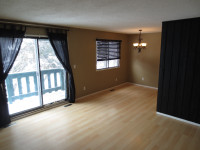 2 Bedroom + Den, Bi-Level Fourplex in Normandeau Red Deer
