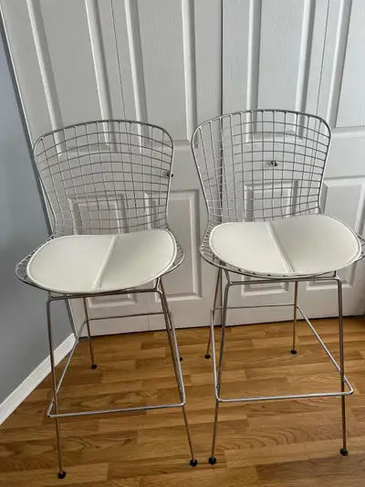 Elevate your kitchen island with this stunning pair of steel wire mesh barstools. A reproduction of...