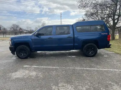 SOLD WITH SAFETY IN HAND Check out this beautiful 2016 Chevy Silverado 1500 Crew Cab with a tall cap...