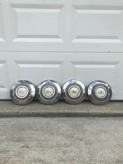 Vintage 55 Pontiac hubcaps, View more