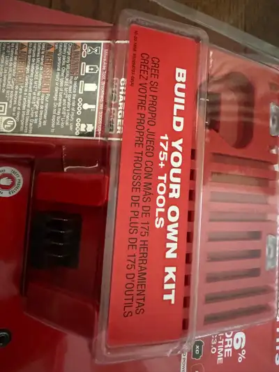 Milwaukee battery and charger combo new , View more