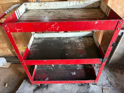 I'm selling a sturdy mechanics tool cart, perfect for any garage or workshop. This three-tier cart i...