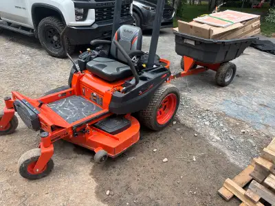 Kabota Z231 with 22 hp 155 hours has bagger unit and trailer new blades 48 inch deck works as it sho...