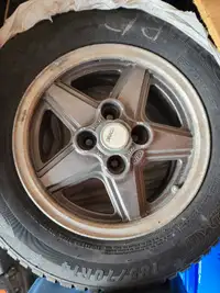 Four Aluminum rim with tires for sale