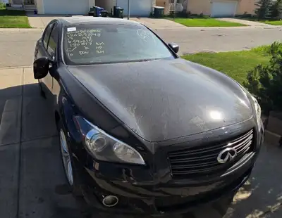 2013 infinity m56 v8 awd powerful car selling salvage car reason is interior vandalism. I don't have...