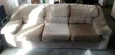 Selling a matching Sealy sofa and loveseat set in a neutral beige/tan fabric. This set has been extr...