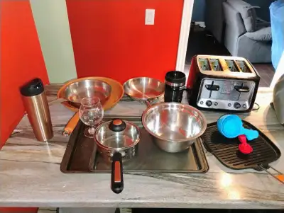 Toaster ,4 frying pans 1 small pot ,1 mixing bowl 2 baking sheets , measuring cups ,2 coffee mugs $5...