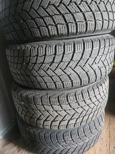 Michelin winter tires Good thread still remains. Only 1 winter used. Rims used on a mazda and honda....