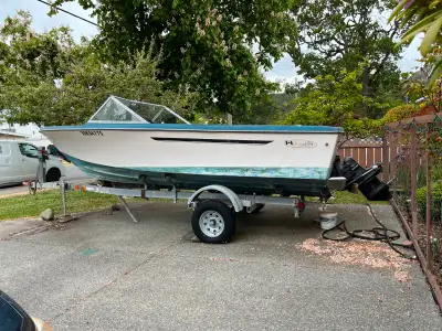OBO Sangster boat and trailer. Trailer has new wheels. Great for a fix-up project. Serious inquiries...
