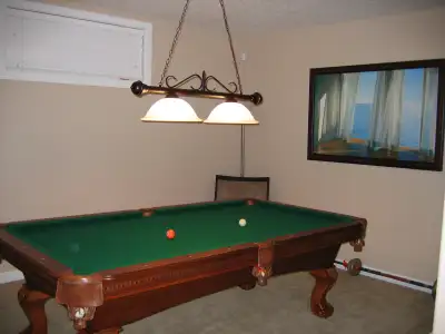 Sport Craft pool table. 44” X 88” playing surface. This is a non-slate pool table. Comes with full s...