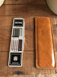 Vintage Arithma Addiator with leather case