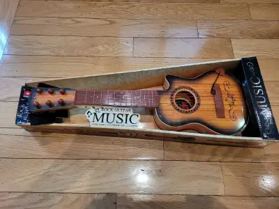 Toy Guitar, View more