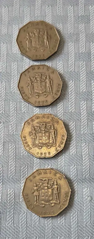 I'm offering four 1975 Jamaican fifty-cent coins, each featuring the country's national coat of arms...