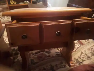 This pine night table is perfect for adding a touch of rustic charm to your bedroom, featuring three...