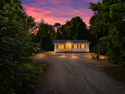 What if your next cottage could also be your year-round home or investment? Welcome to this **brand-...