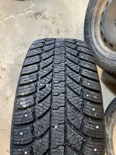 245/60R18 Studded General Grabber Artic winter tires with steel wheels. Two winters on the tires. Bo...