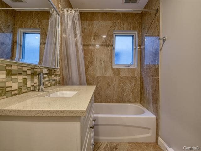 À LOUER – Haut de duplex 5 ½ semi-meublé – 5 mim REM ROXBORO — photo 1