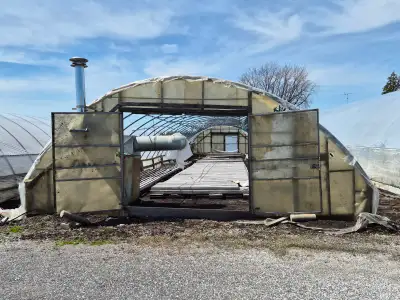 Large commercial‑grade greenhouse available for sale. Approx. 27 feet wide by 96 feet long, heavy‑du...