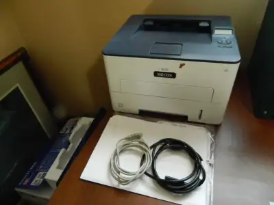 Xerox model B230 black & white laser printer. Fast at 42 pages per minute one-sided and 18 pages per...