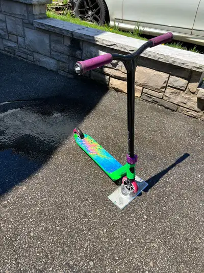 Prodigy customized scooter with stand. Good condition.