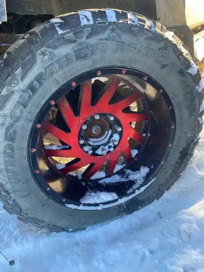 sizing is 35x12.50 R 20 full set of rims and tires, no center caps but they can be purchased online...