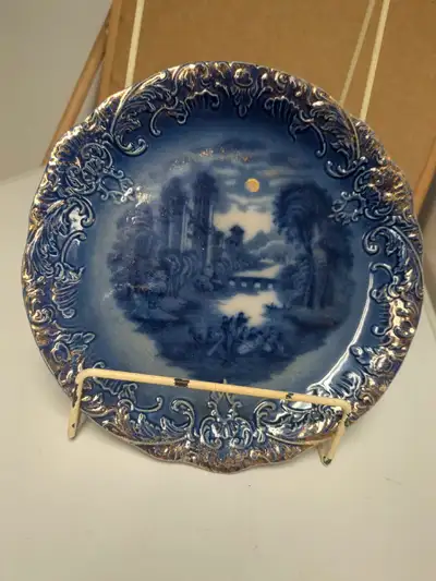 A lovely sample of antique flow blue decorative scenic plate measuring approximately 8 and 1/2 in in...