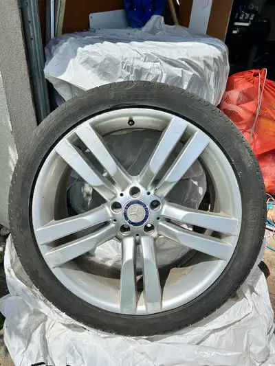 I'm selling a set of four Mercedes Benz rims, each with a Pirelli tire, sized at 255/45R20 101W. The...