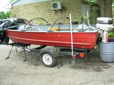 -14 ft. boat 20 hp. motor Johnson....Little Dude trailer -boar cover and motor cover -3 life jackets...